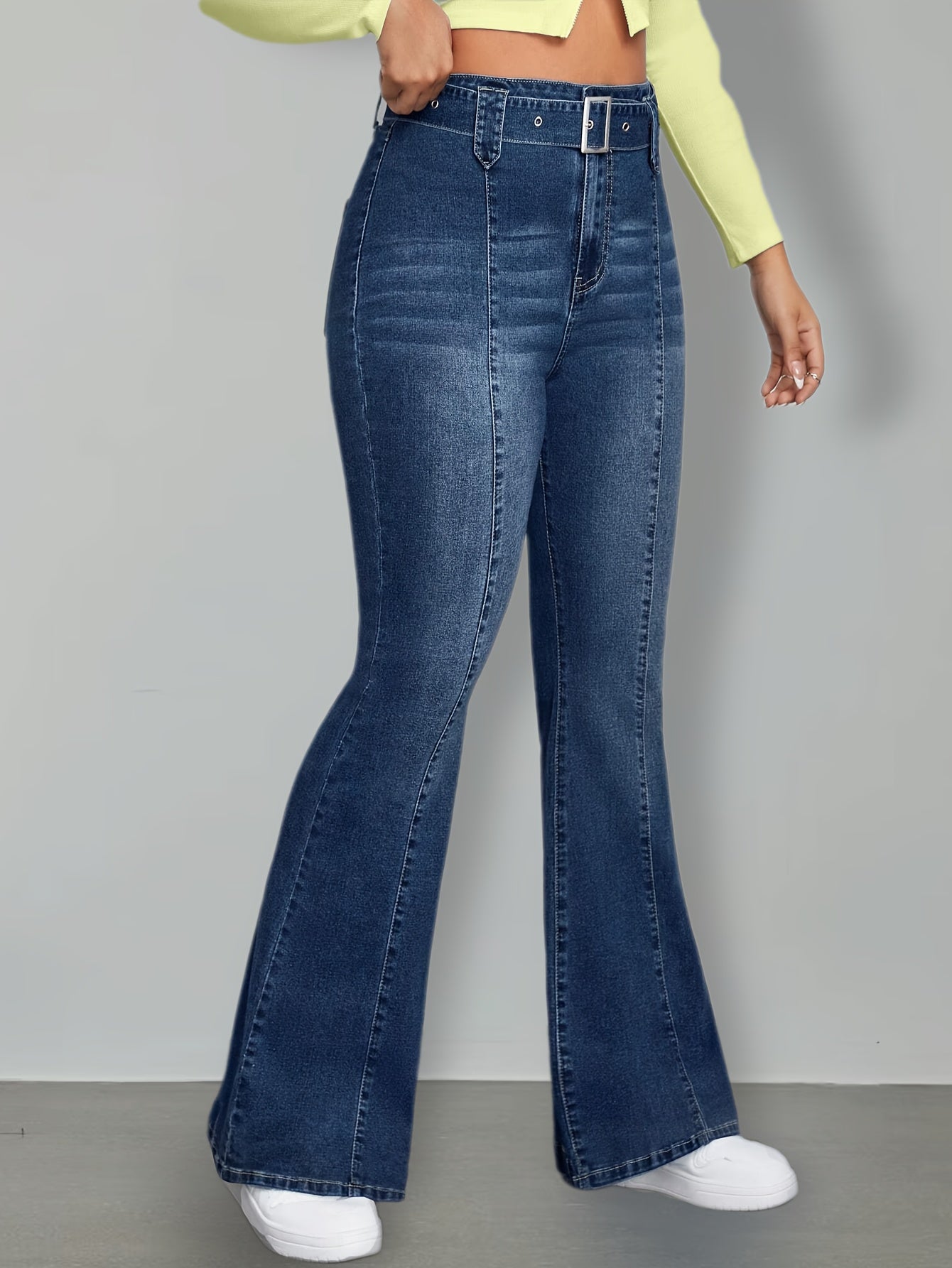 Effortless Medium Blue Buckle Jeans for Women with High Waist Flare Leg Relaxed Casual Style
