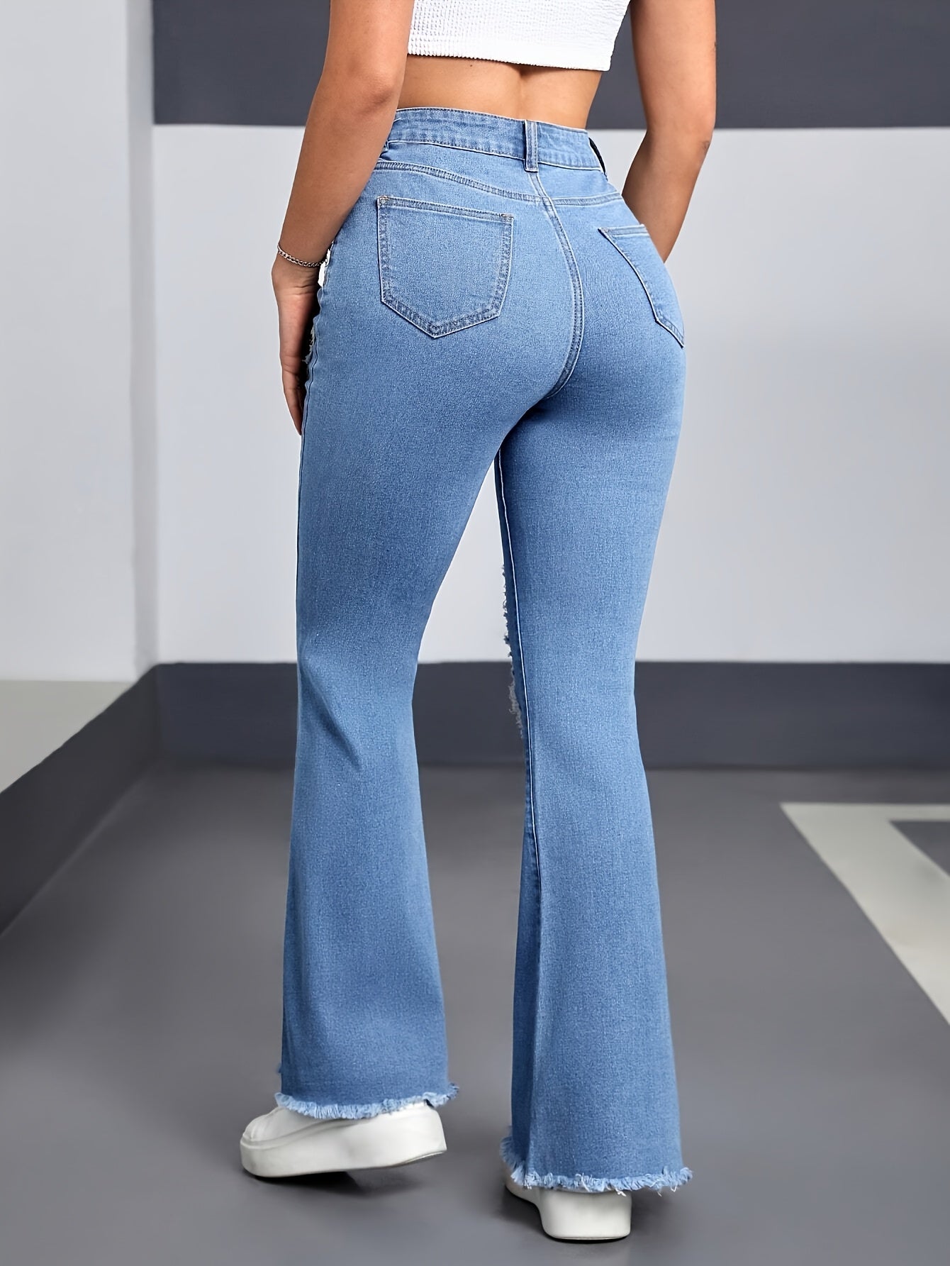 Effortless Light Blue Distressed Flare Jeans for Women with High Waist Heart Patch Frayed Hem Casual Style