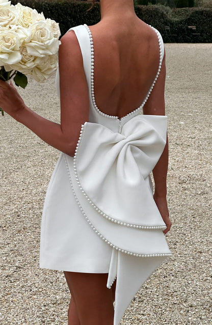 Elegant Pearl Trim Mini Dress for Women with Bateau Neck Sleeveless Bow Back Fit Flare Style