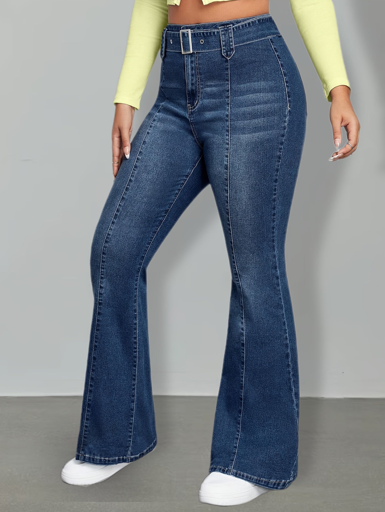 Effortless Medium Blue Buckle Jeans for Women with High Waist Flare Leg Relaxed Casual Style