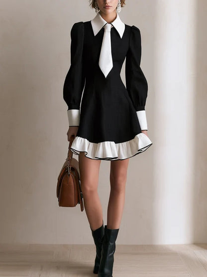 Elegant Black and White Dress for Women with Contrast Collar Tie Neck Lantern Sleeve Ruffle Hem Style