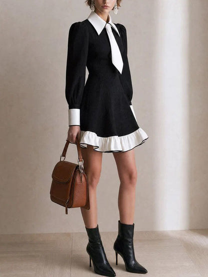 Elegant Black and White Dress for Women with Contrast Collar Tie Neck Lantern Sleeve Ruffle Hem Style
