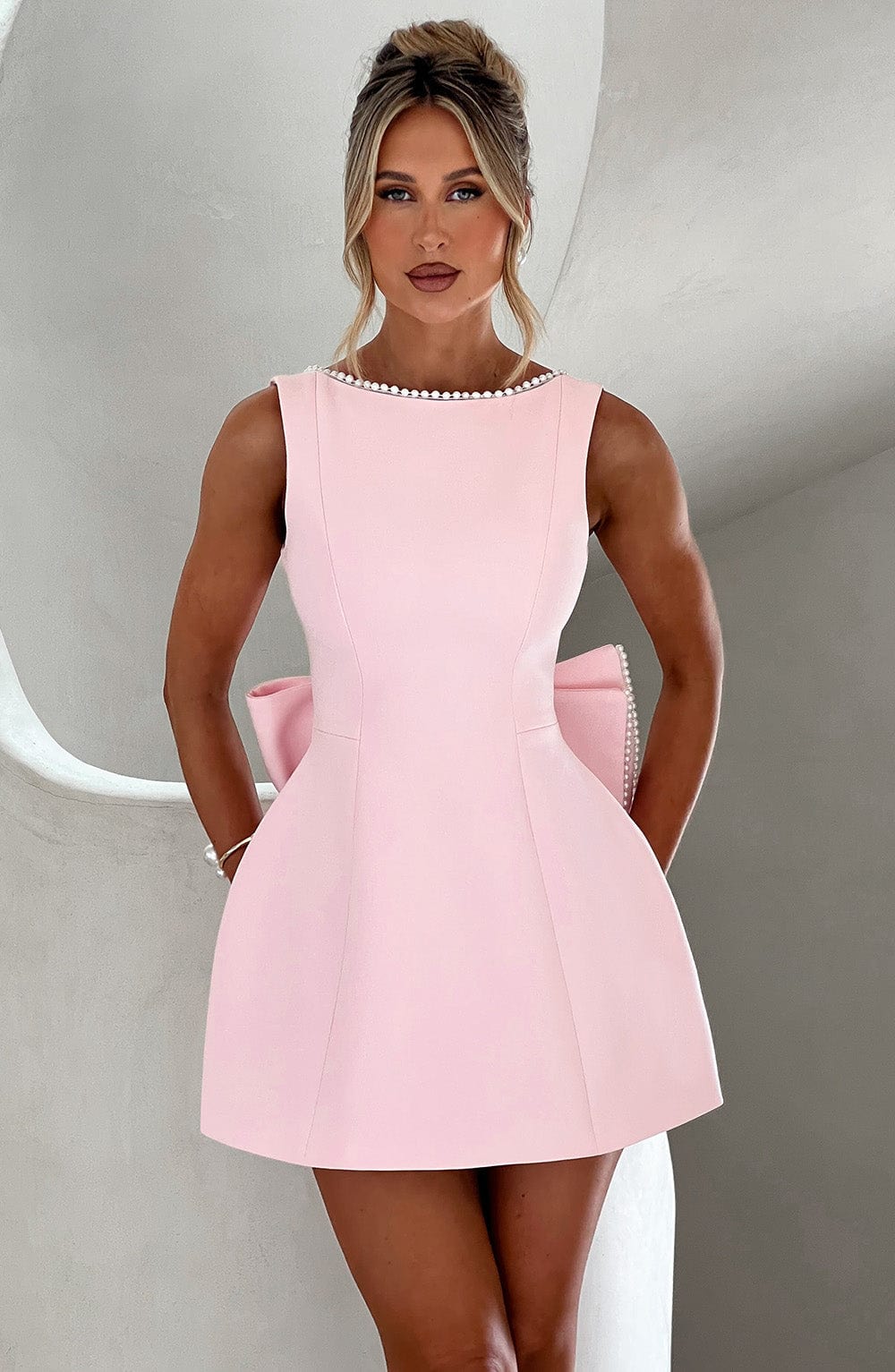 Elegant Pearl Trim Mini Dress for Women with Bateau Neck Sleeveless Bow Back Fit Flare Style