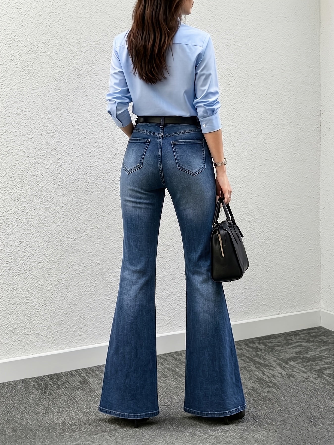 Elegant Medium Blue High Waisted Jeans for Women with Flare Leg Back Pocket Relaxed Casual Style