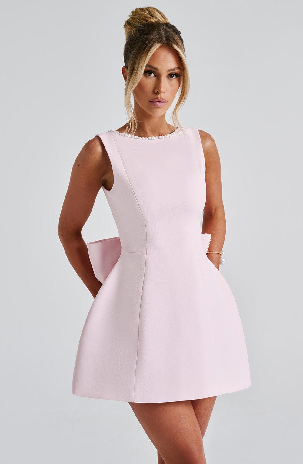 Elegant Pearl Trim Mini Dress for Women with Bateau Neck Sleeveless Bow Back Fit Flare Style