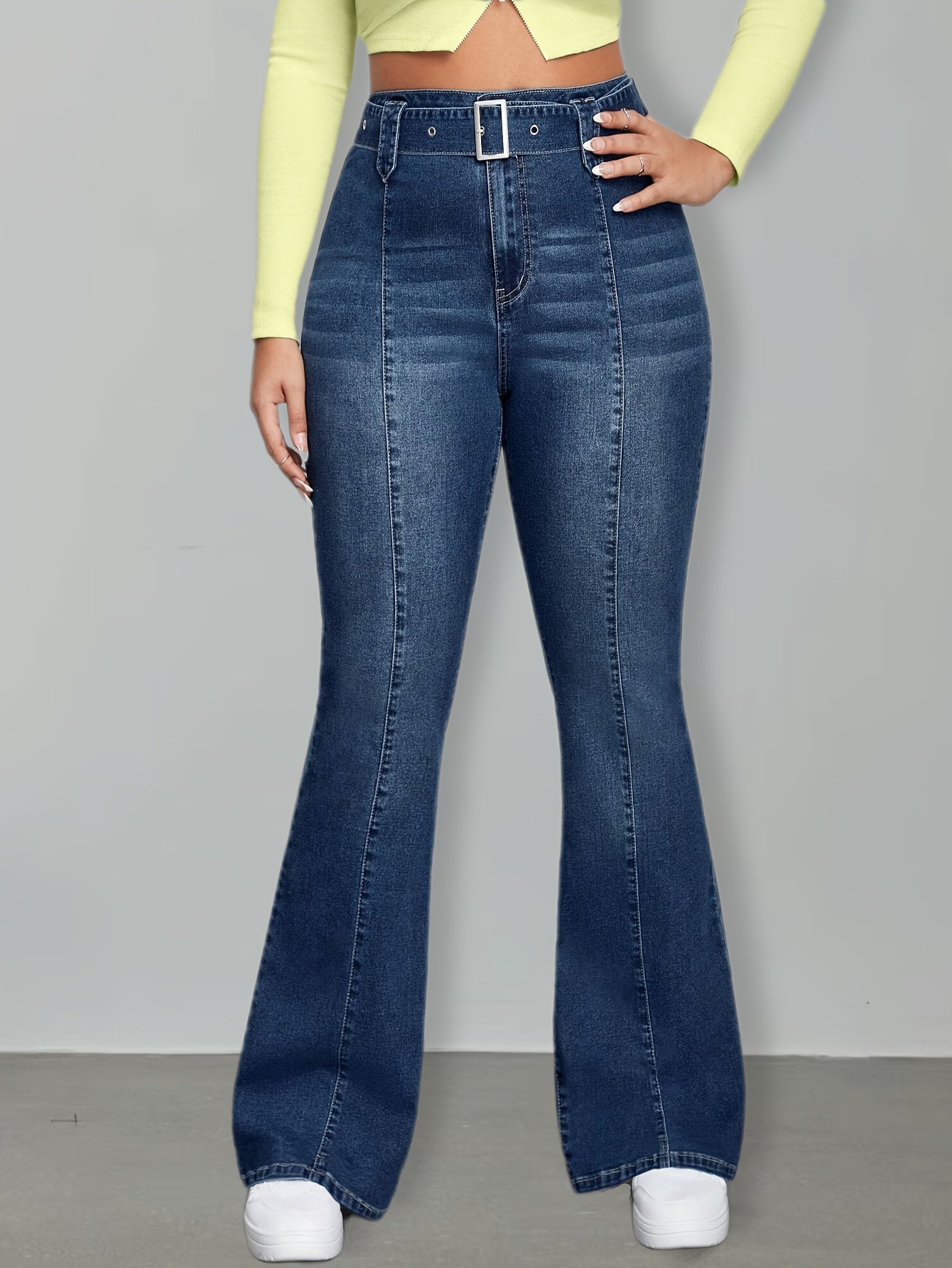 Effortless Medium Blue Buckle Jeans for Women with High Waist Flare Leg Relaxed Casual Style