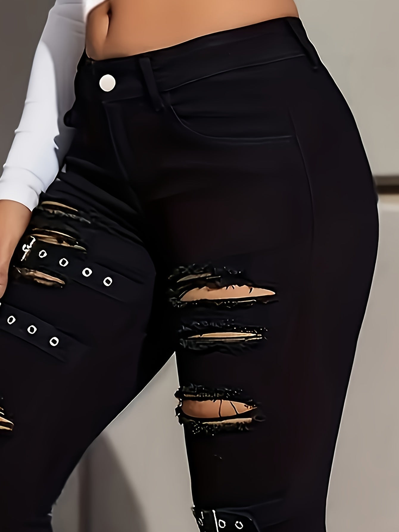 Stylish Black Distressed Flare Jeans for Women with Buckle Strap Ripped Relaxed Style
