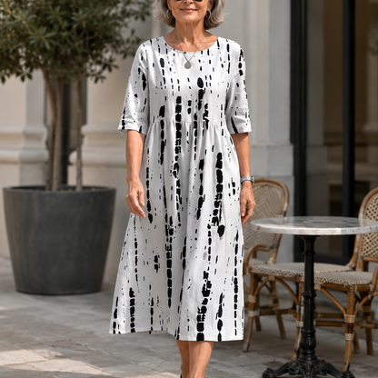 Effortless Floral Midi Dress for Women with Round Neck Elbow Sleeve Empire Waist Flowing Style