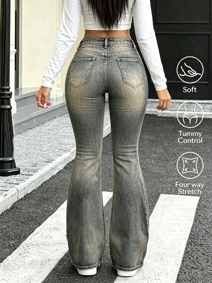 Effortless Blue Distressed Flare Jeans for Women with Frayed Raw Edge Asymmetric Buckle Detail Style