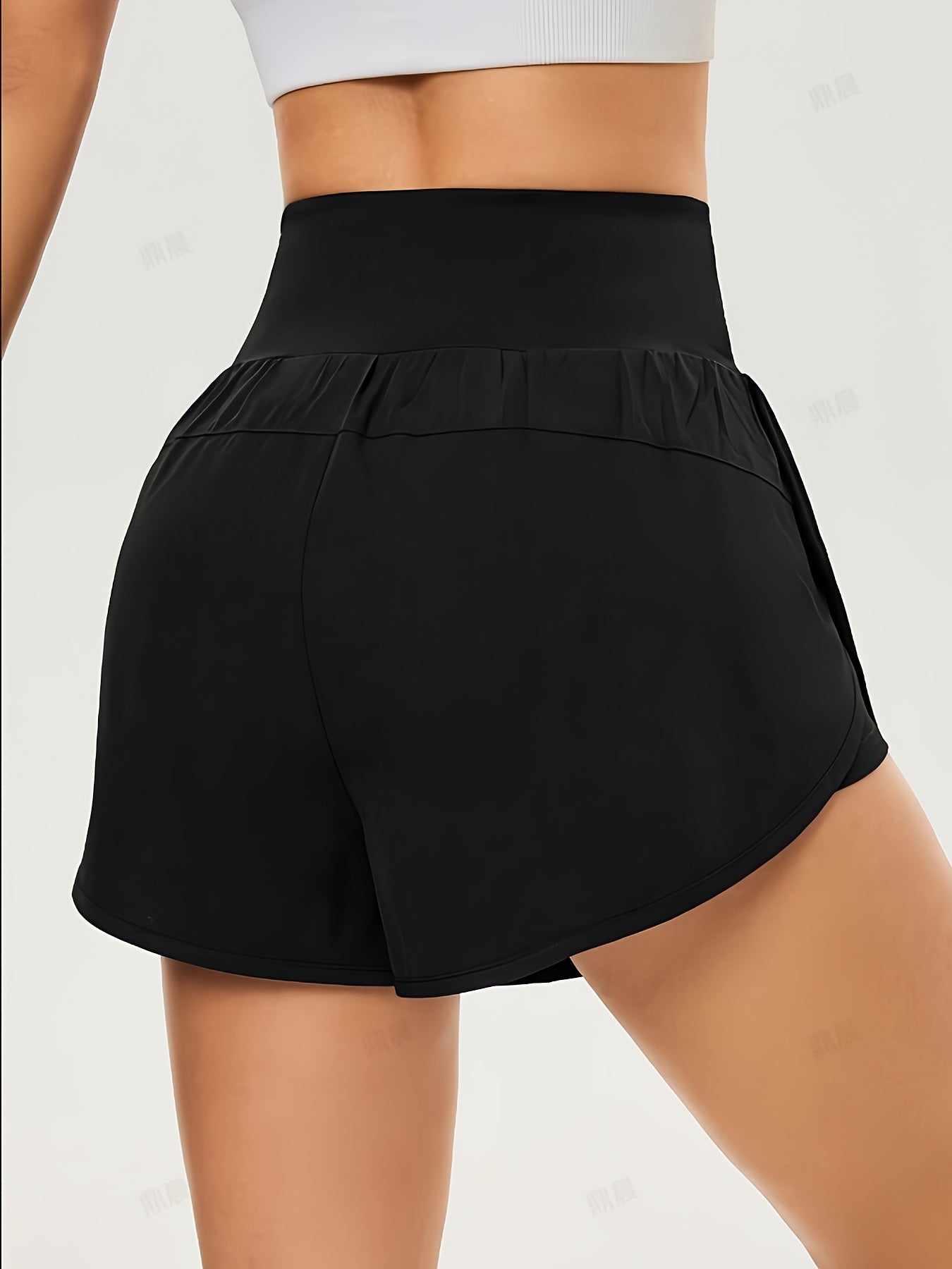 Effortless Black Running Shorts for Women with High Waist Crossover Dolphin Hem Athletic Style