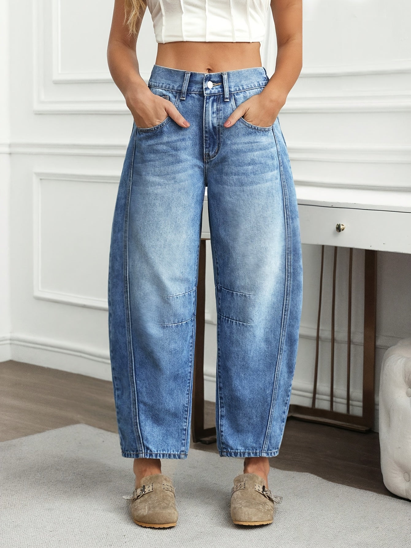 Effortless Light Blue Relaxed Barrel Jeans for Women with High Waist Curved Leg Faded Wash