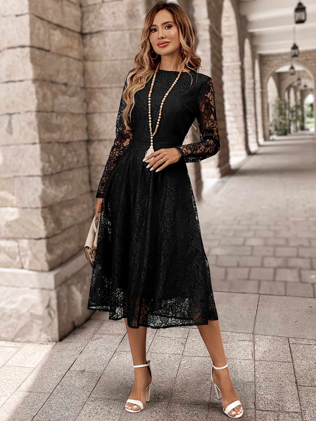 Elegant Black Lace Long Sleeve Wedding Dress for Women with Round Neck Fit And Flare Flowing Style
