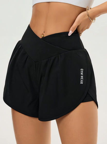 Effortless Black Running Shorts for Women with High Waist Crossover Dolphin Hem Athletic Style