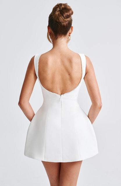 Elegant Pearl Trim Mini Dress for Women with Bateau Neck Sleeveless Bow Back Fit Flare Style