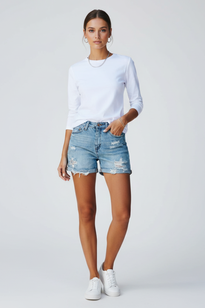 Effortless Light Blue Distressed Denim Shorts for Women with High Waisted Rolled Cuff Frayed Casual Style