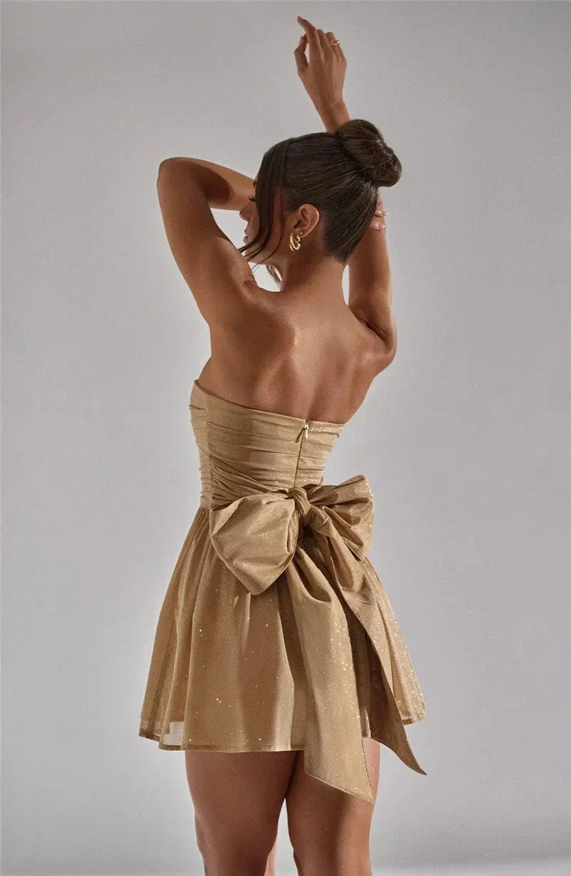Elegant Glitter Gold Dress for Women with Strapless Ruched Bodice Bow Back Fit Flare Style