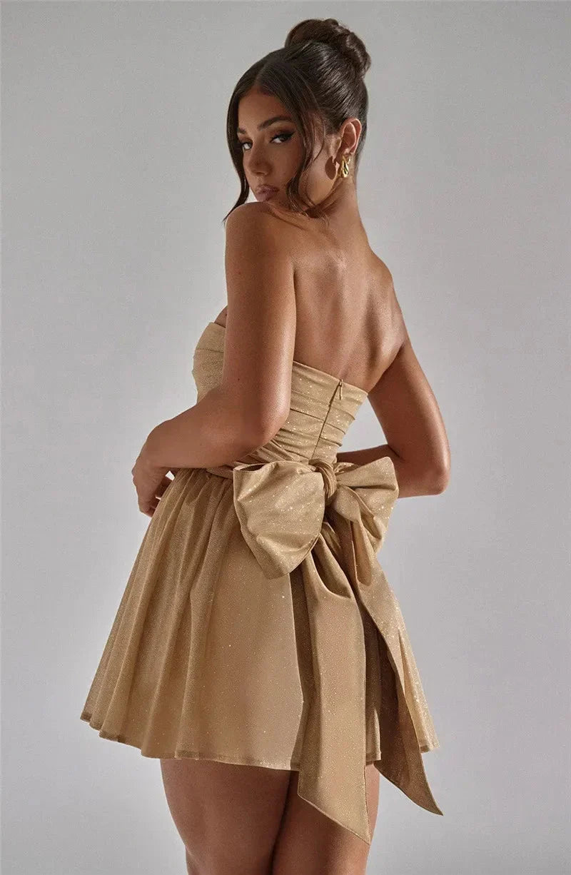 Elegant Glitter Gold Dress for Women with Strapless Ruched Bodice Bow Back Fit Flare Style