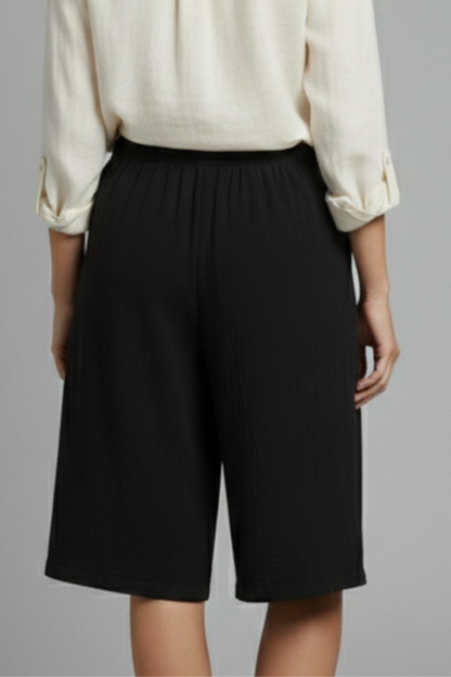 Effortless Wide Leg Shorts for Women with Elastic High Waist Side Button Hem Pocket Casual Style