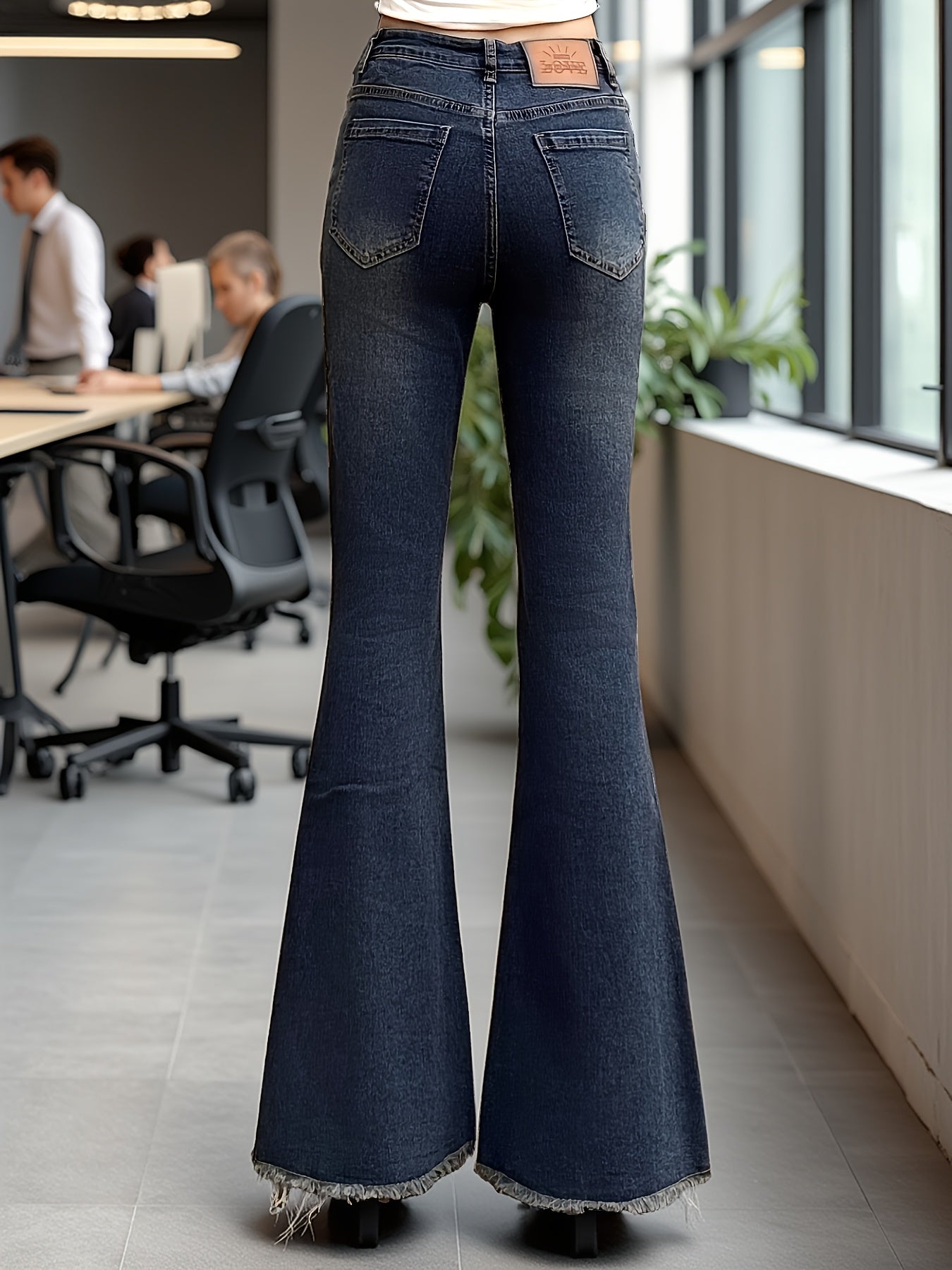 Effortless Medium Blue High Waisted Jeans for Women with Frayed Hem Flare Leg Relaxed Casual Style
