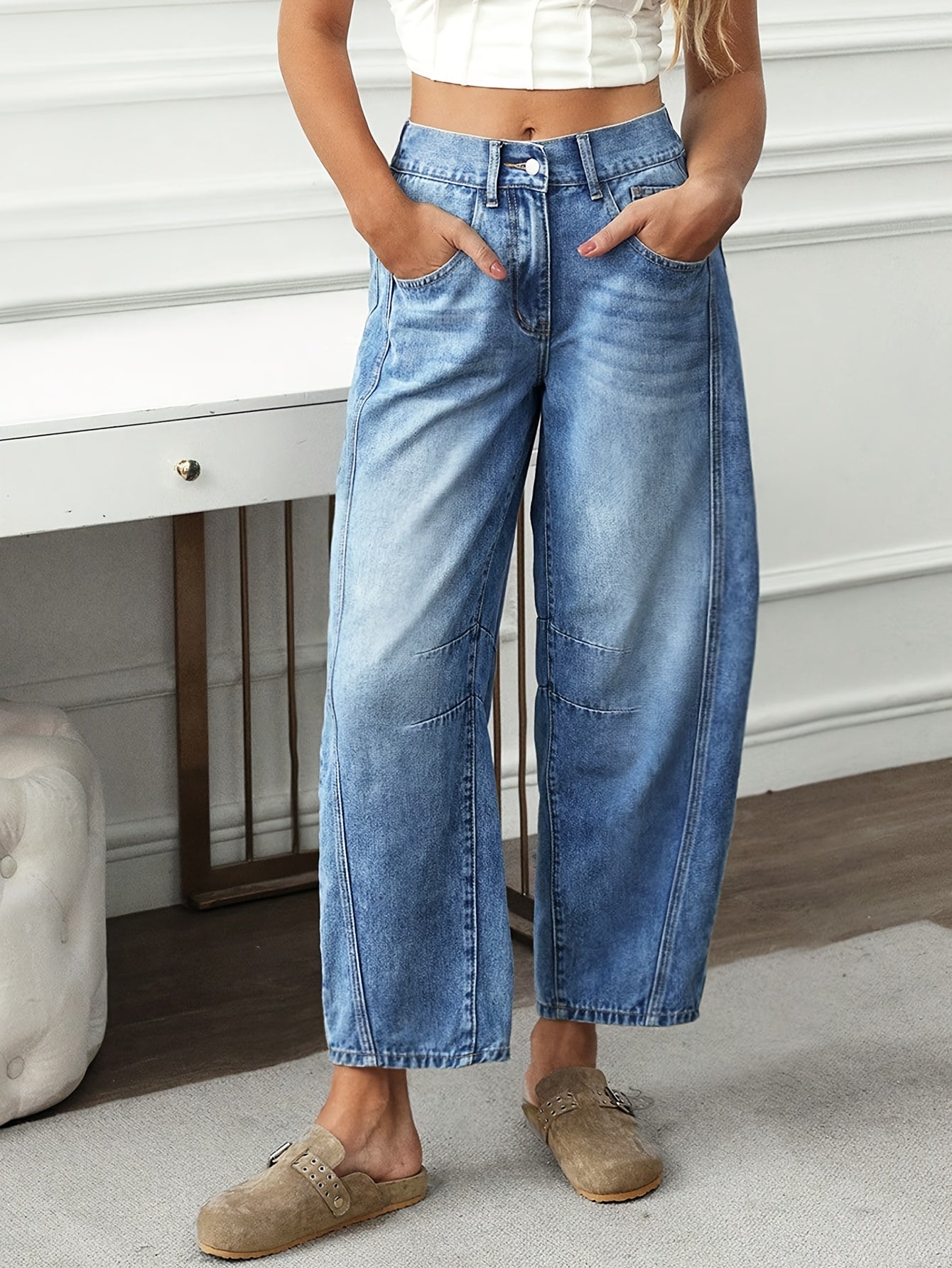 Effortless Light Blue Relaxed Barrel Jeans for Women with High Waist Curved Leg Faded Wash