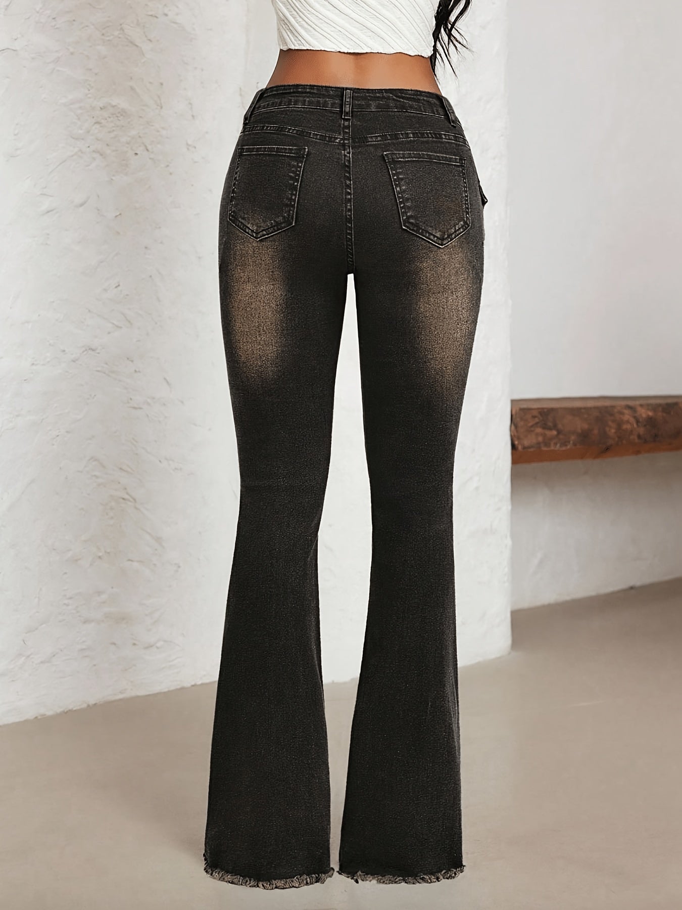 Effortless Distressed Denim Buckle Jeans for Women with Low Rise Grommet Waist Flare Frayed Hem Style