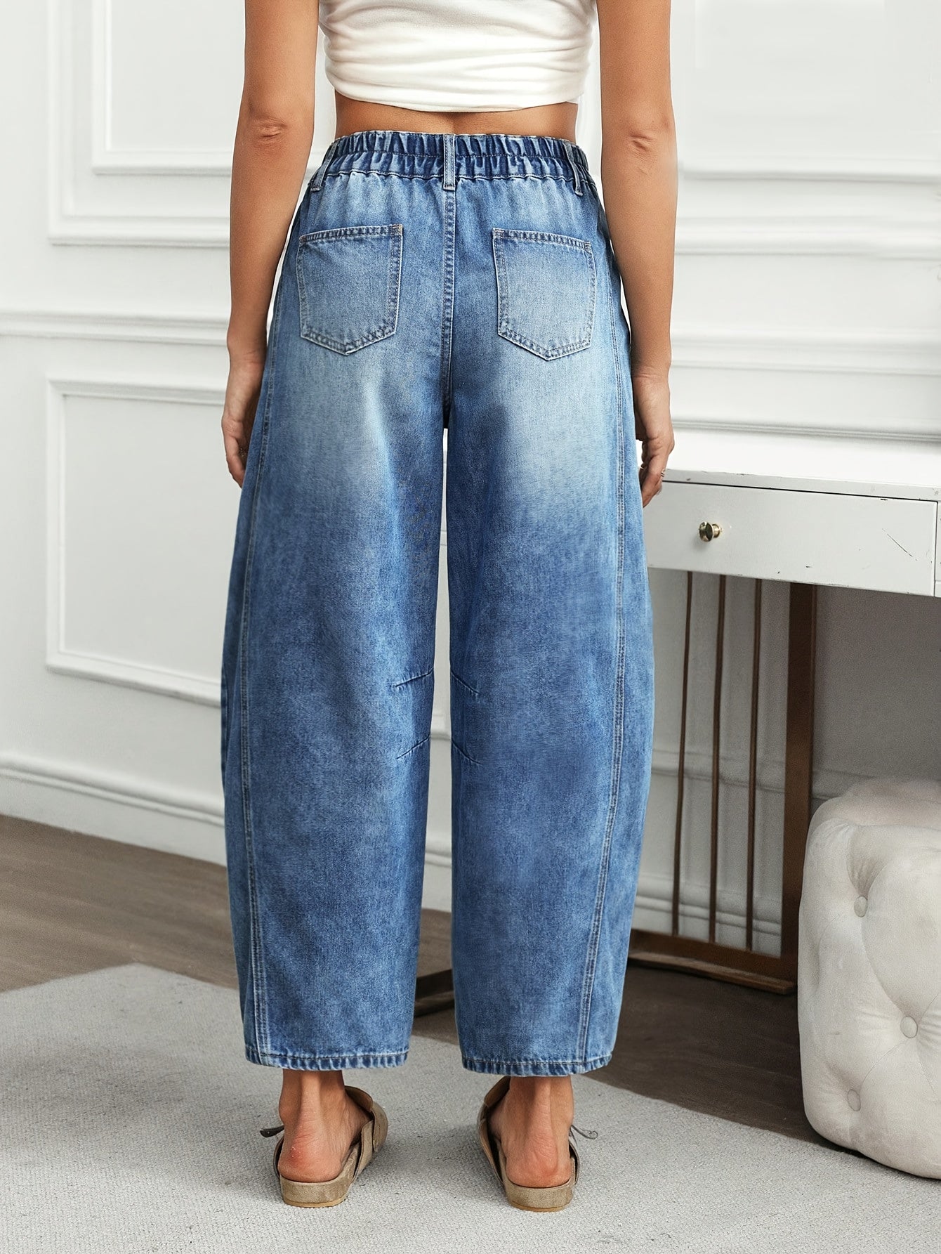 Effortless Light Blue Relaxed Barrel Jeans for Women with High Waist Curved Leg Faded Wash