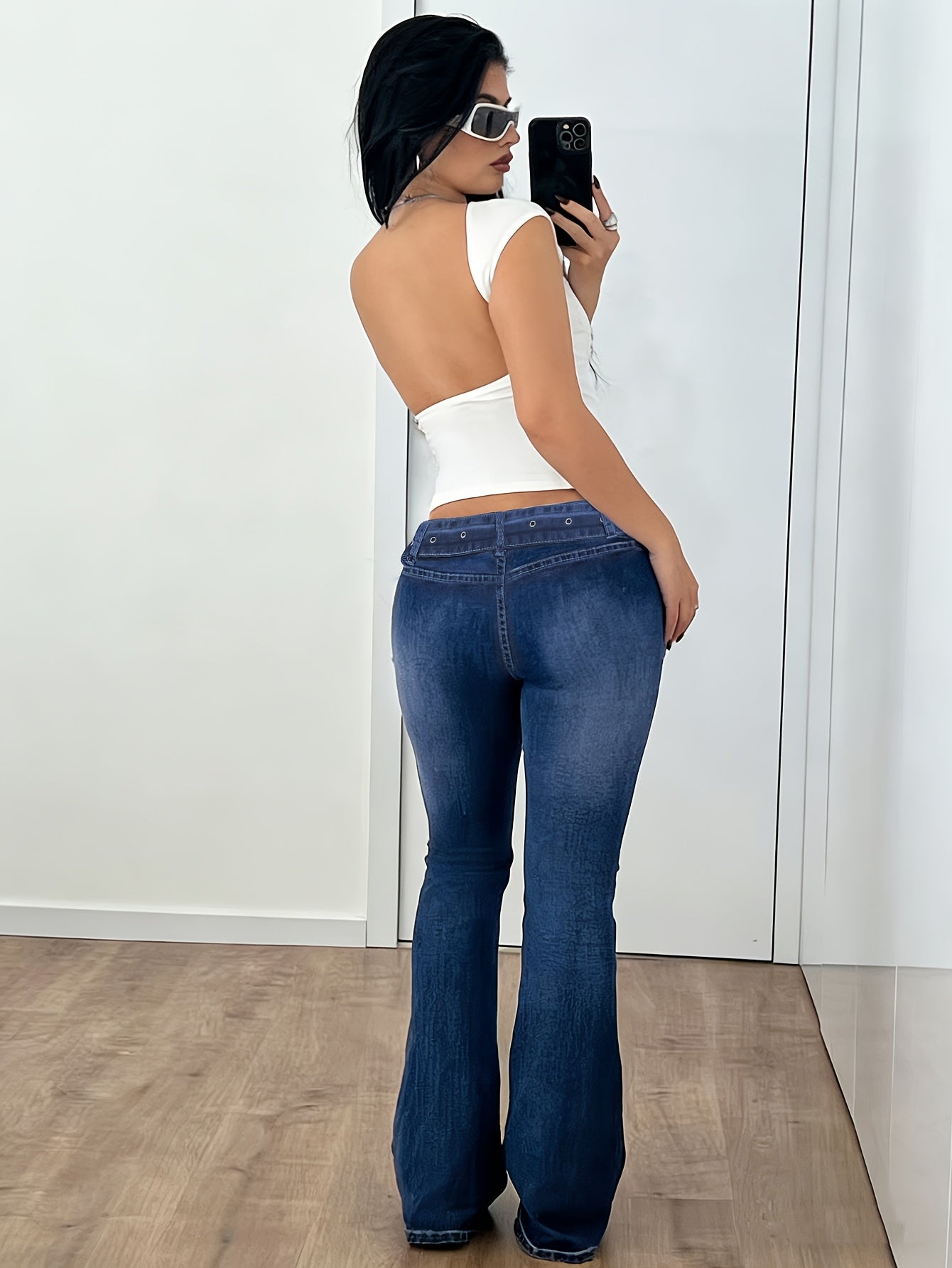 Effortless Medium Blue Flare Jeans for Women with Low Rise Belted Grommet Contrast Stitch Style