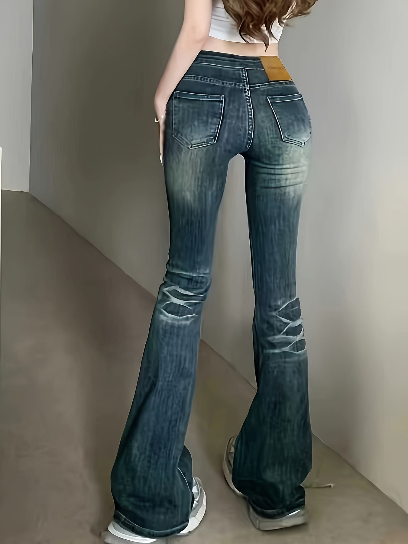 Effortless Blue Distressed Flare Jeans for Women with Grommet Belt Low Rise Whiskered Streetwear Style