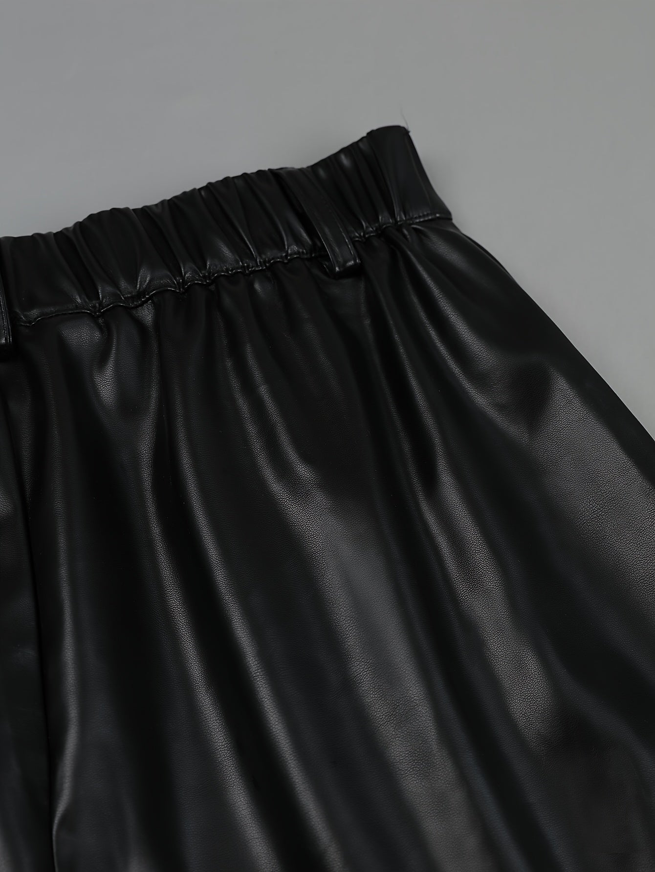Sleek Black Leather Slacks for Women with High Waist Wide Leg Pleated Relaxed Style