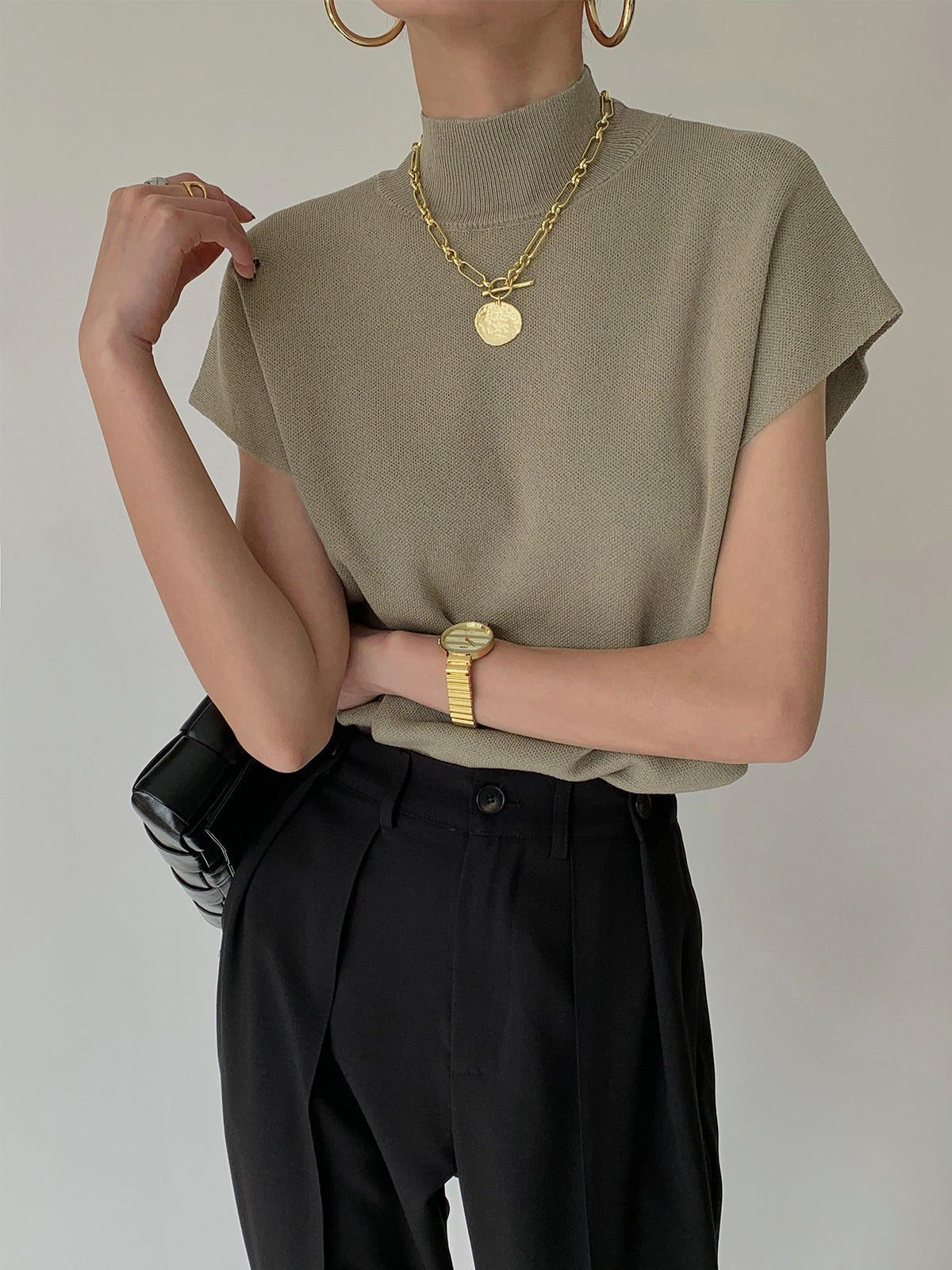 Elegant Sleeveless Top for Women with High Neck Cap Sleeve Knit Casual Style