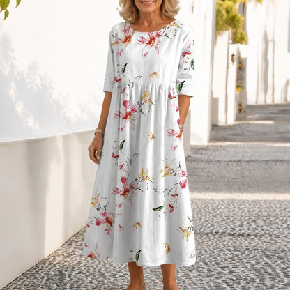 Effortless Floral Midi Dress for Women with Round Neck Elbow Sleeve Empire Waist Flowing Style