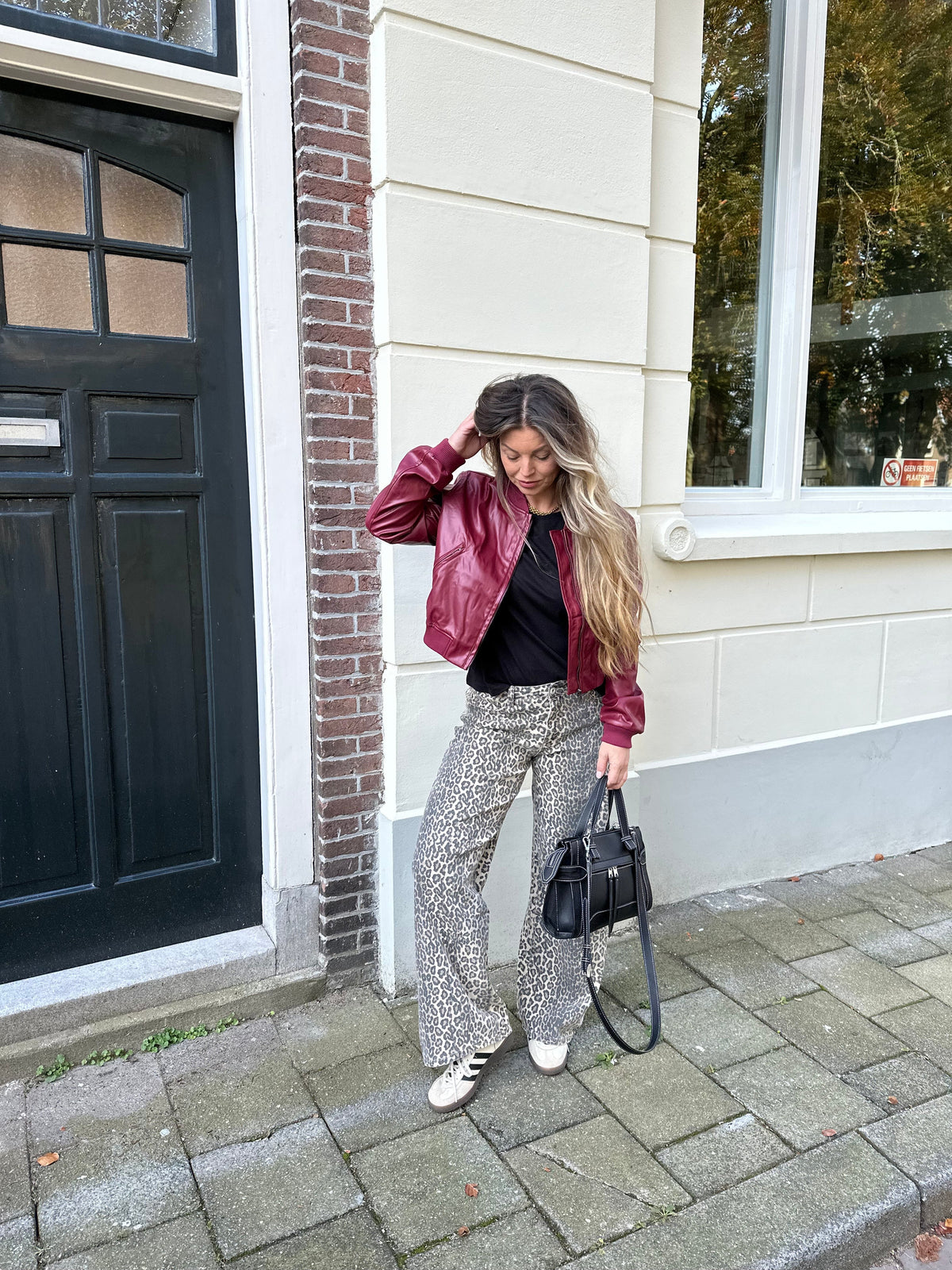 Effortless Leather Jacket for Women with Ribbed Collar Long Sleeve Zip Front Bomber Style